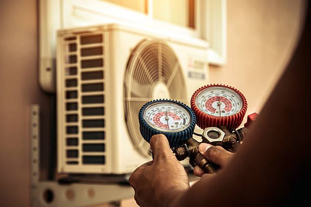 Professional Hvac technician working in Yucca Valley, CA